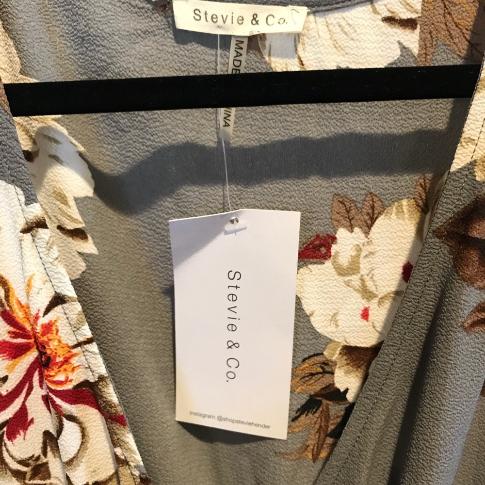 Dress, size medium, new never worn. Wrap style